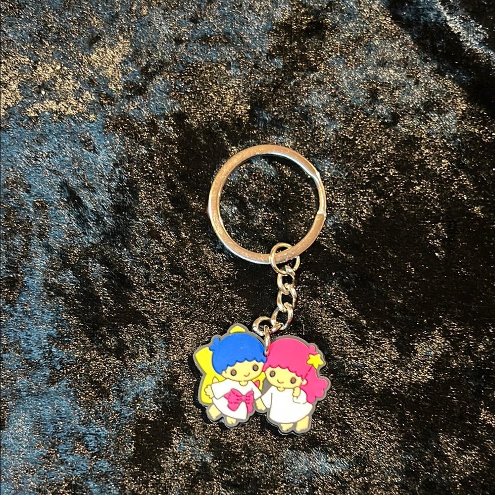 Cute Character Keychain with Blue and Pink Accents